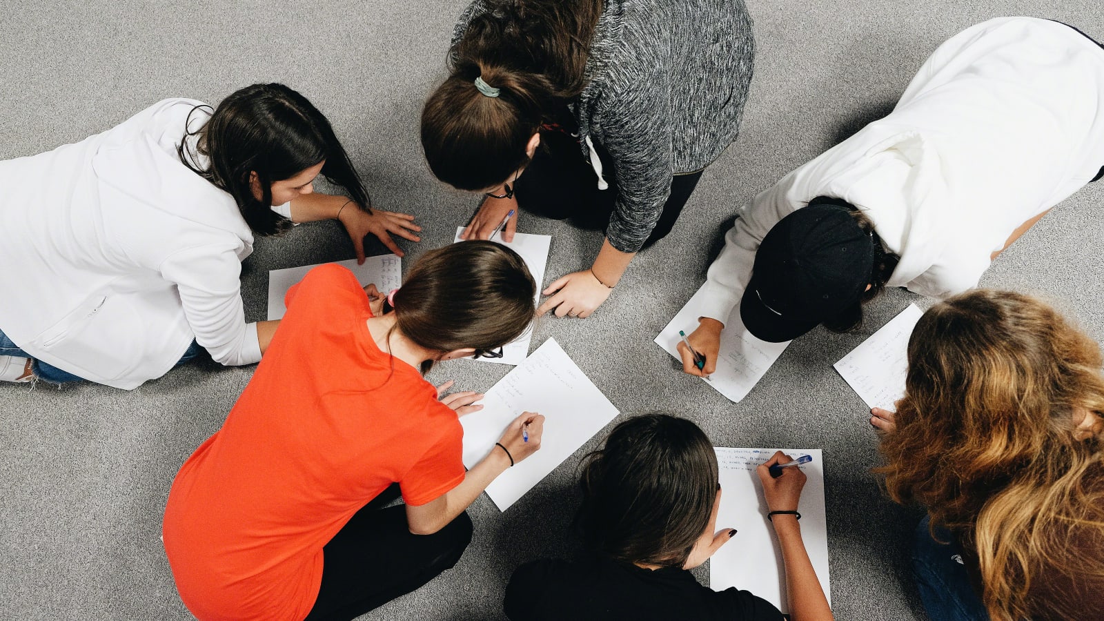 A photograph of children participating in a learning activity.